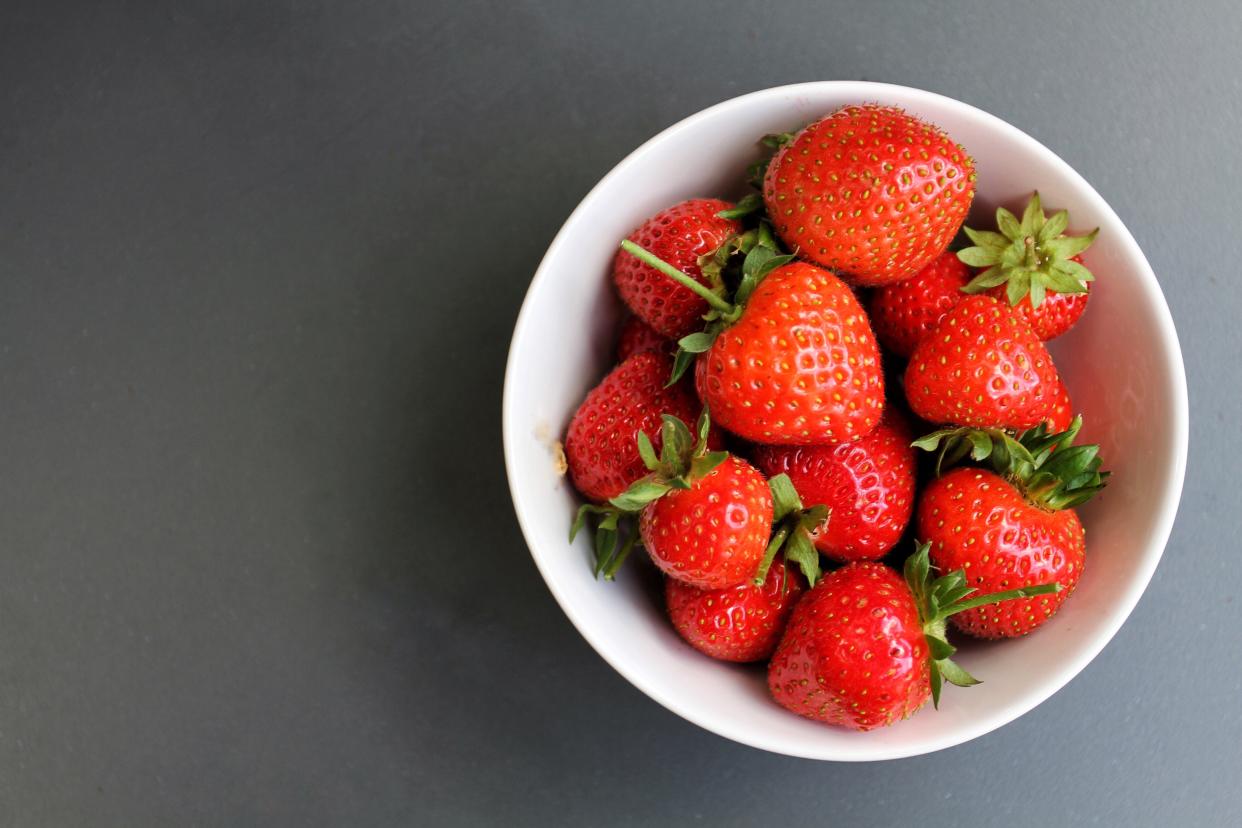 A daily serving of strawberries, in season during the UK's summer, may boost heart health among obese people. (Stock, Getty Images)