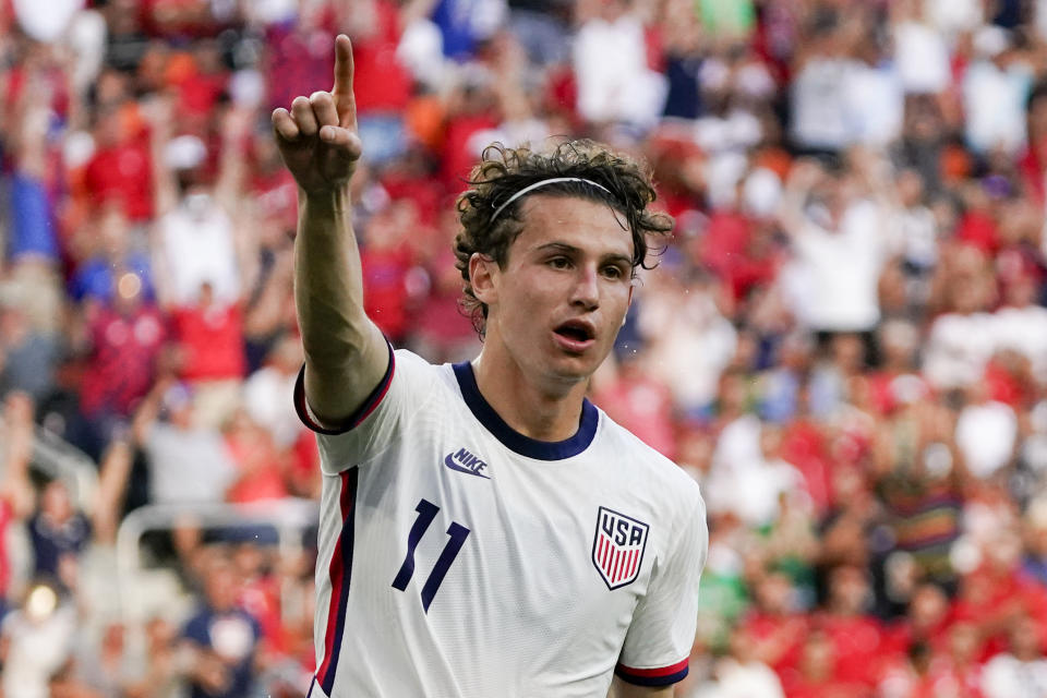 FILE - United States forward Brenden Aaronson (11) reacts after scoring a goal during the first half of a friendly soccer match against Morocco, June 1, 2022, in Cincinnati. Forward Josh Sargent and midfielder Luca de La Torre will miss the United States' Nations League games because of injuries and were replaced on the roster Sunday, March 17, 2024, by winger Aaronson and forward Haji Wright. (AP Photo/Jeff Dean, File)