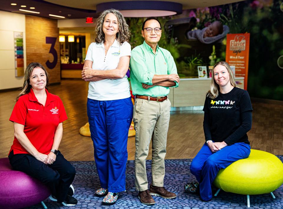 Dr. William Liu, the Medical Director of the Golisano Children’s Hospital NICU along with from left, Nichole Shimko, Nurse Manager of the Critical Care Transport Team of Golisano Children’s Hospital, Nancy Vossler, Nursing Director of the Neonatal ICU at Golisano Children’s Hospital and Carly Majewski, a Nurse Manager of the Neonatal ICU Golisano Children’s Hospital pose for portrait at Golisano Children’s Hospital on Tuesday, Sept. 5, 2023. The group helped get babies in the NICU transported to safety during Hurricane Ian last year.