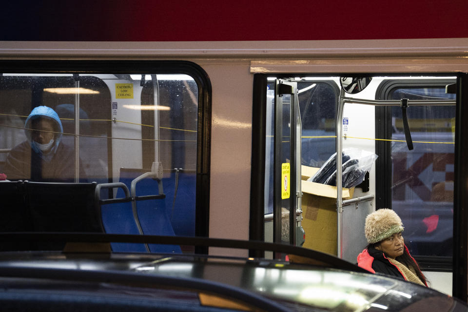 Migrants sent by Texas Gov. Greg Abbott arrive near 30th Street Station Wednesday morning, Nov. 16, 2022, in Philadelphia. (AP Photo/Joe Lamberti)