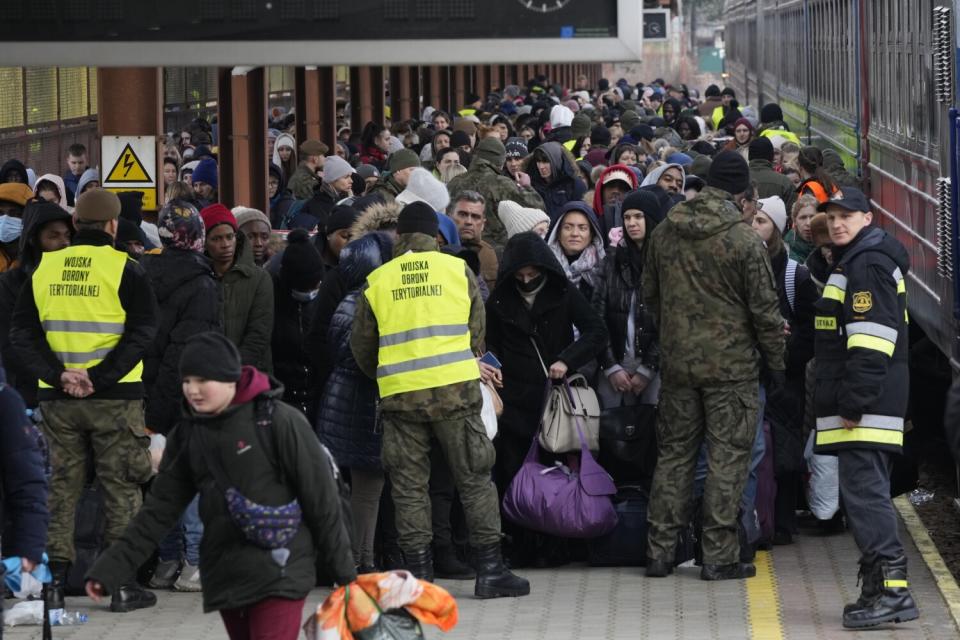 Refugees from Ukraine arrive to the railway station in Przemysl, Poland