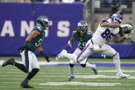 New York Giants' Evan Engram (88), right, makes a catch during the first half of an NFL football game against the Philadelphia Eagles, Sunday, Nov. 28, 2021, in East Rutherford, N.J. (AP Photo/Corey Sipkin)