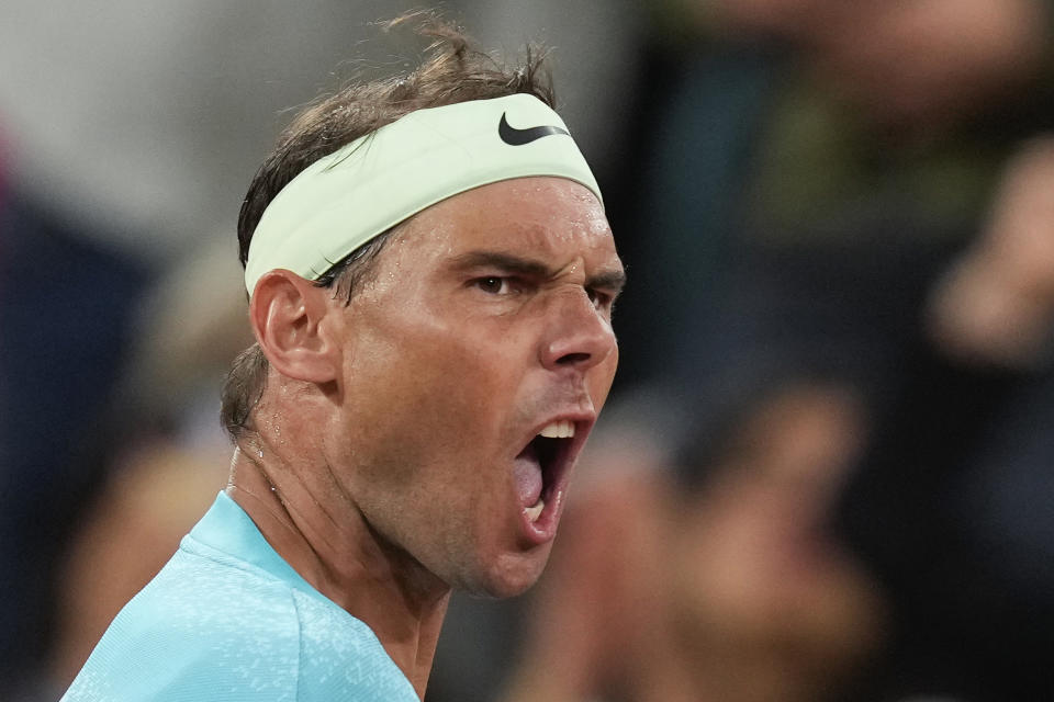 Spain's Rafael Nadal celebrates scoring a point during his first round match of the French Open tennis tournament against Germany's Alexander Zverev at the Roland Garros stadium in Paris, Monday, May 27, 2024. (AP Photo/Thibault Camus)