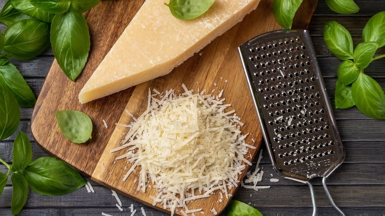 grated parmesan cheese with grater