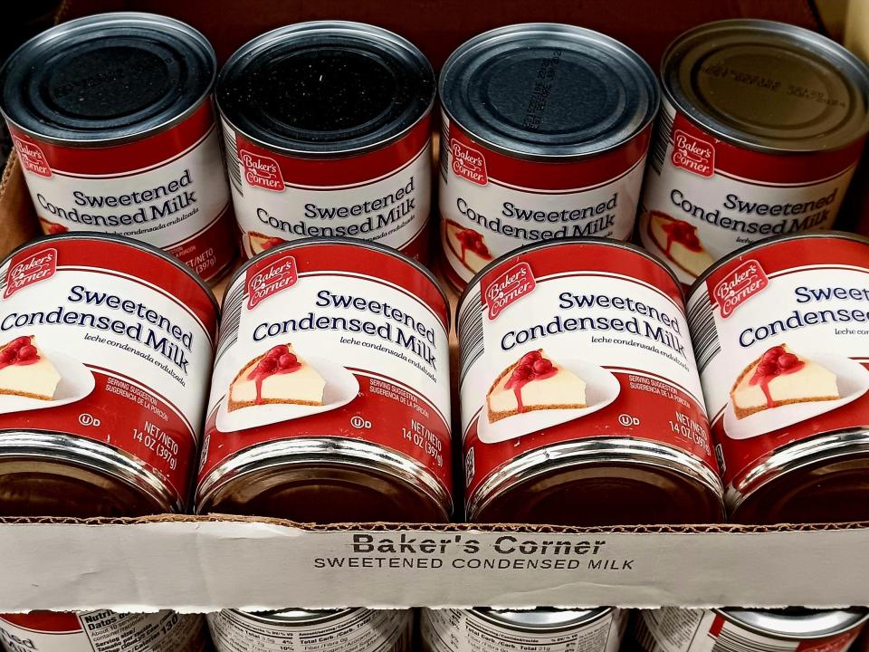 Cans of sweetened condensed milk