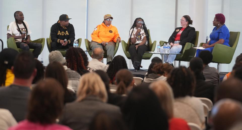 Tay'Lynn Hurt (fourth from left) talks about being a student in an era of gun violence during The Columbus Dispatch Teens and Gun Violence Community Conversation in October. On the panel discussion are, from left, student Kalia Watkins, Legacy Youth Academy Co-Founder Dominic Jones, Mothers of Murdered Columbus Children founder Malissa Thomas-St. Clair, Hurt, Moms Demand Action Columbus Co-Lead Shannon Mulligan and moderator and Columbus Dispatch Opinion and Community Engagement Editor Amelia Robinson. The Dispatch partnered with Columbus City Council, Columbus Metropolitan Library and Columbus City Schools to host the event at the main library downtown.