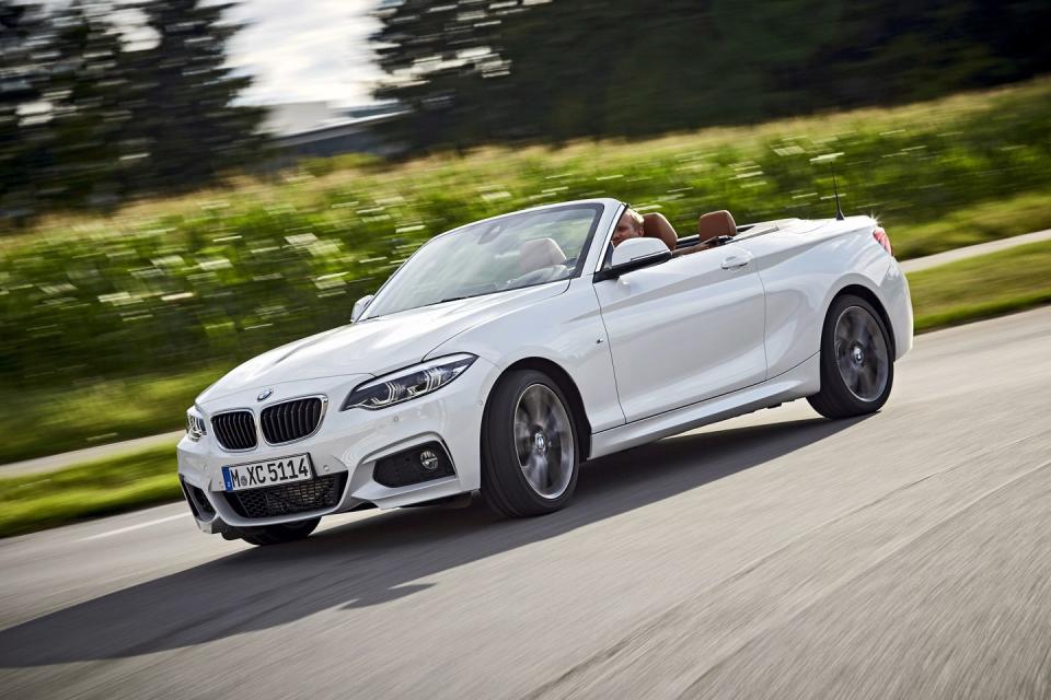 <p>Want something luxurious, but don't want to park a big car in tight spaces? The BMW 2-Series may be the car for you. It has many of the features you can get on bigger BMWs, but without any of the extra length. You can even <a href="https://www.roadandtrack.com/new-cars/a10239681/bmw-2-series-manual-transmission-option/" rel="nofollow noopener" target="_blank" data-ylk="slk:get it with a manual;elm:context_link;itc:0;sec:content-canvas" class="link ">get it with a manual</a>. Want to save money? <a href="https://www.ebay.com/itm/2014-BMW-2-Series-228i/264339960228?hash=item3d8be3b1a4:g:hE4AAOSw8PJc7JM9" rel="nofollow noopener" target="_blank" data-ylk="slk:Here's a lightly used example;elm:context_link;itc:0;sec:content-canvas" class="link ">Here's a lightly used example</a> listed for under $18,000. </p>