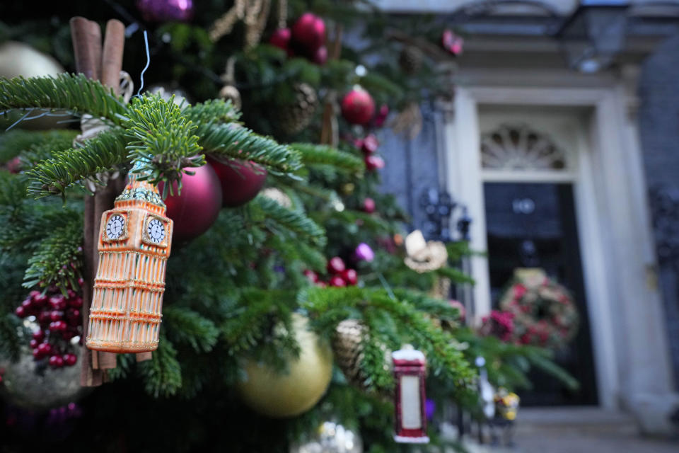 A Christmas tree decoration in the shape of Big Ben hangs on the tree in Downing Street in London, Tuesday, Nov. 28, 2023. A diplomatic spat erupted Monday between Greece and Britain after the U.K. canceled a planned meeting of their prime ministers, prompting the Greek premier to accuse his British counterpart of trying to avoid discussing the contested Parthenon Marbles. (AP Photo/Kirsty Wigglesworth)