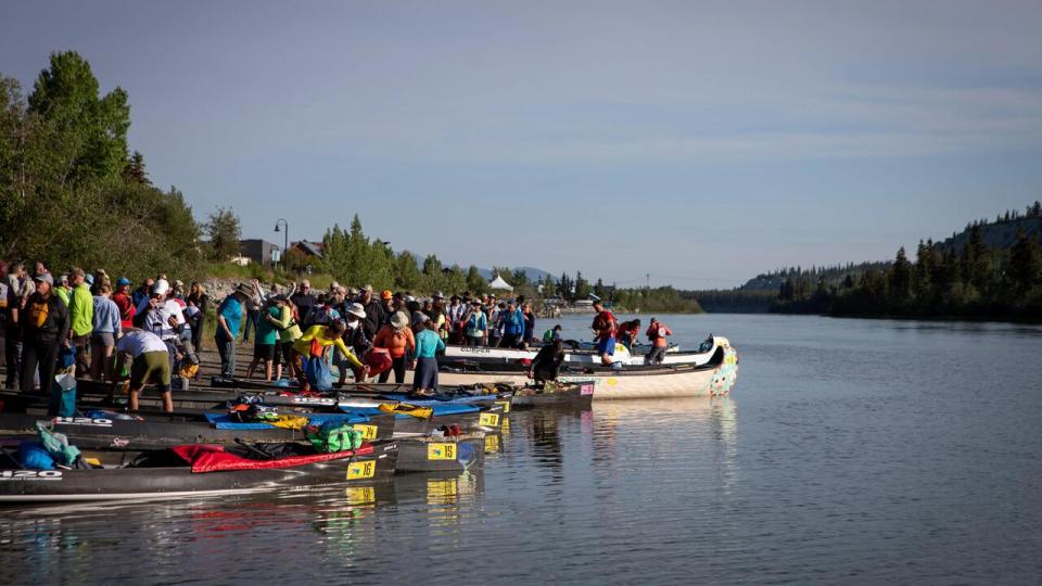 Paddlers ready to leave Whitehorse in the 2024 Yukon River Quest, June 26, 2024.