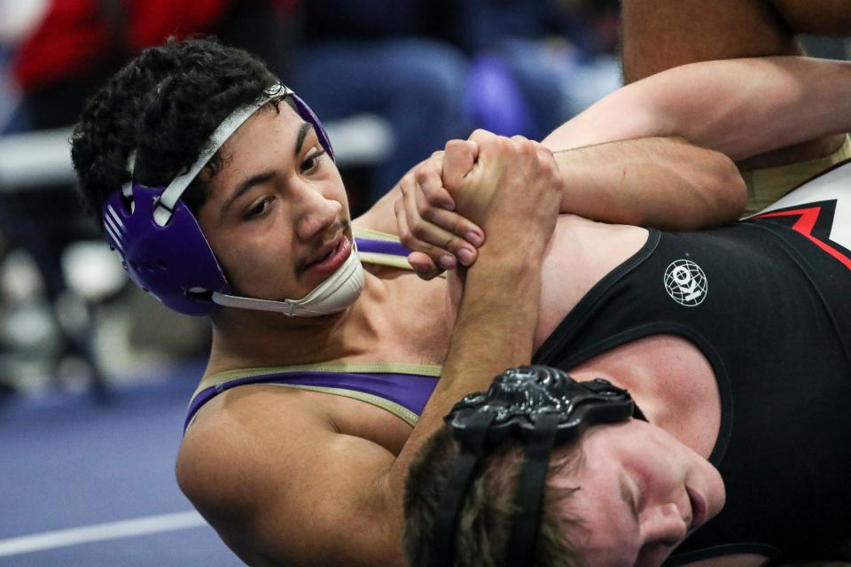 Miller's Abraham Aguirre defeats Victoria West's Landon Sheffel during the District 15-5A wrestling tournament on Thursday, Feb. 2, 2023, at Carroll High School in Corpus Christi, Texas.