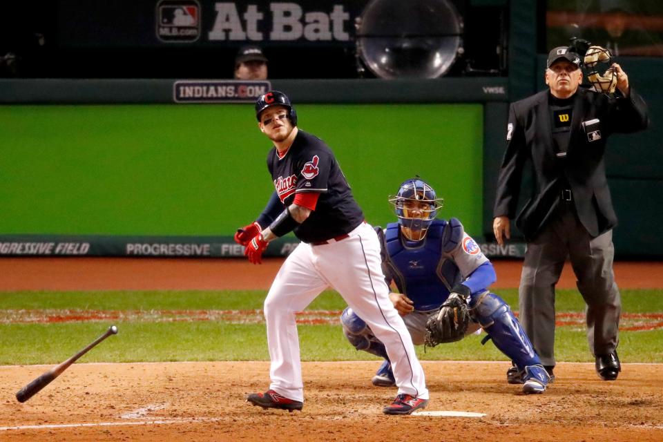 Roberto Perez hitting one of his two Game 1 homers. (Getty Images)