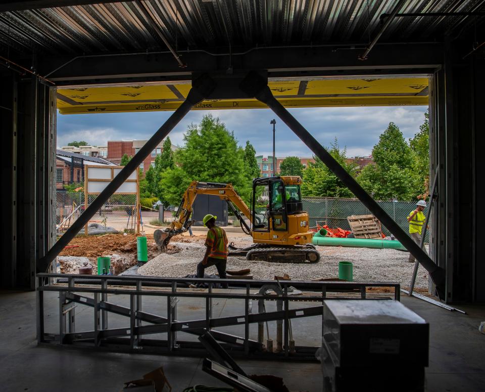 A new tech center under construction across the street from The Mill in Bloomington aims to have half its office spaces rented next year.