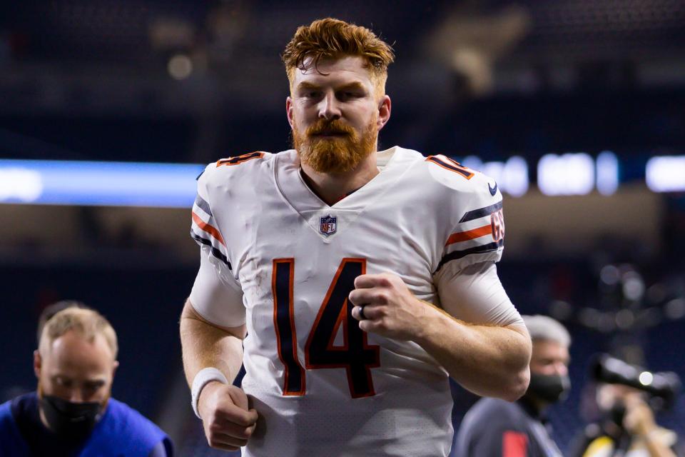 Nov 25, 2021; Detroit, Michigan, USA; Chicago Bears quarterback Andy Dalton (14) jogs off the field after the game against the Detroit Lions at Ford Field. Mandatory Credit: Raj Mehta-USA TODAY Sports