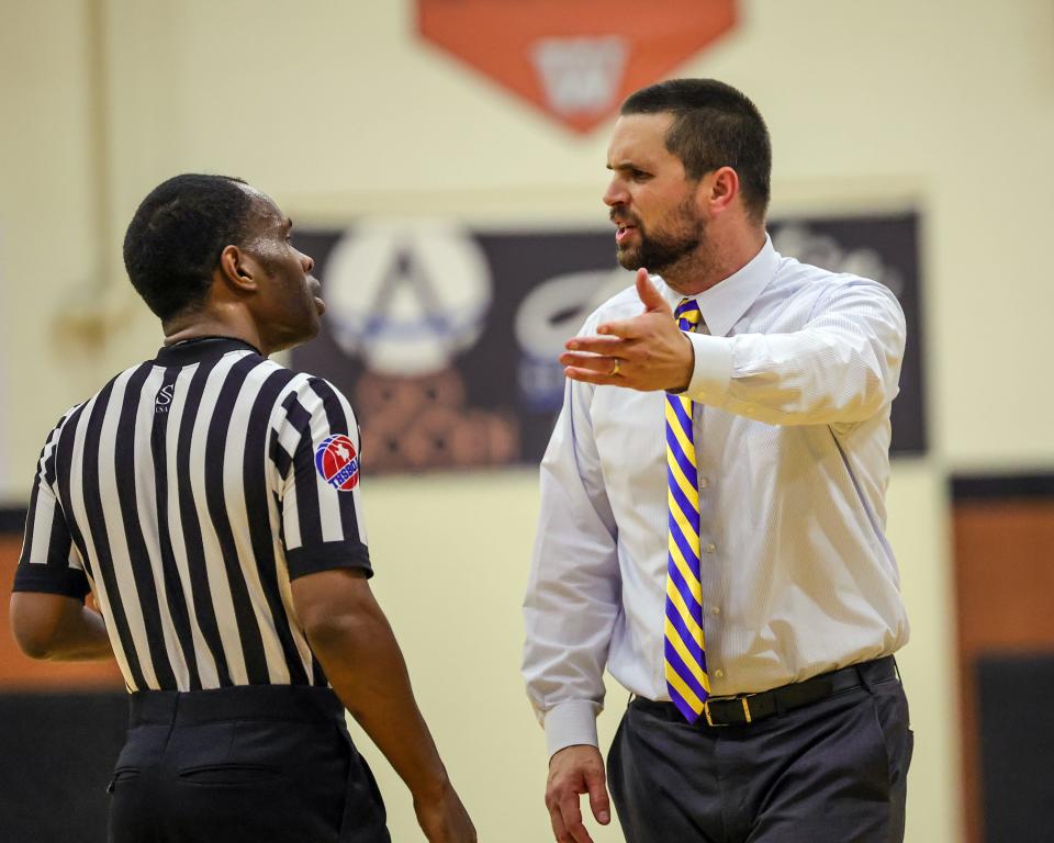 Anderson head coach Daniel Pittsford expresses his displeasure to the official against Westwood on Tuesday at Westwood High School in Class 6A nondistrict play. Back in Class 6A, Anderson lost 48-44 to the Warriors.