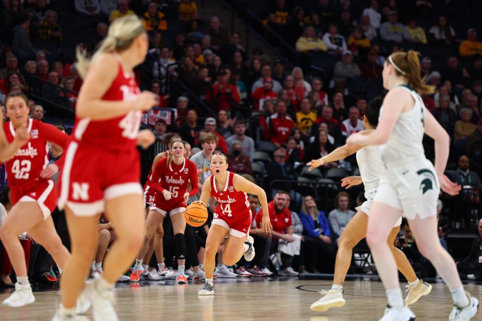 MINNEAPOLIS, MINNESOTA - MARCH 08: Callin Hake #14 of the Nebraska Cornhuskerss brings the ball up court against the Michigan State Spartans in the Quarterfinal Round of the Big Ten Tournament at Target Center on March 08, 2024 in Minneapolis, Minnesota.(Photo by Adam Bettcher/Getty Images)