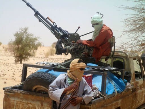 Islamist rebels of Ansar Dine are pictured in April 2012 near Timbuktu. The March 22 coup in Mali allowed Tuareg rebels and Islamists to make large gains in the country's desert north