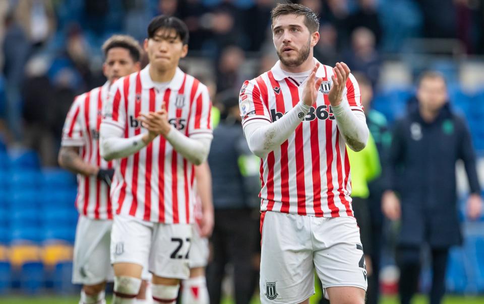 A dejected Lynden Gooch cheers on the Stoke supporters