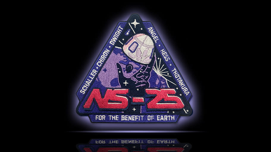 Blue Origin NS-25 triangular mission patch with a capsule floating out of a stylized hand filled with stars.