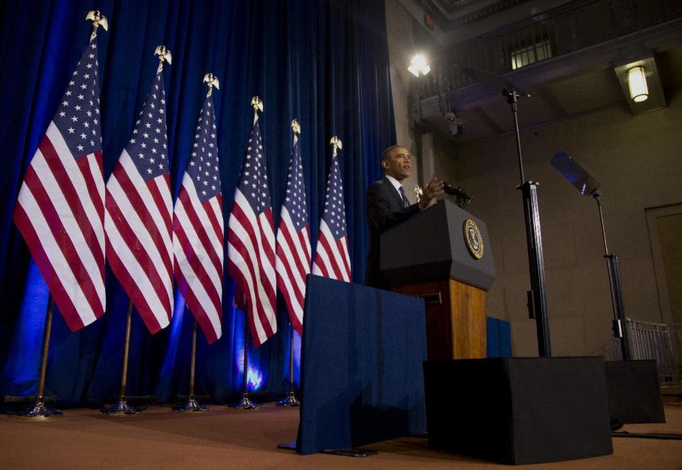 President Barack Obama talks about National Security Agency (NSA)surveillance, Friday, Jan. 17, 2014, at the Justice Department in Washington. Seeking to calm a furor over U.S. surveillance, the president called for ending the government's control of phone data from -hundreds of millions of Americans and immediately ordered intelligence agencies to get a secretive court's permission before accessing the records. (AP Photo/Carolyn Kaster)