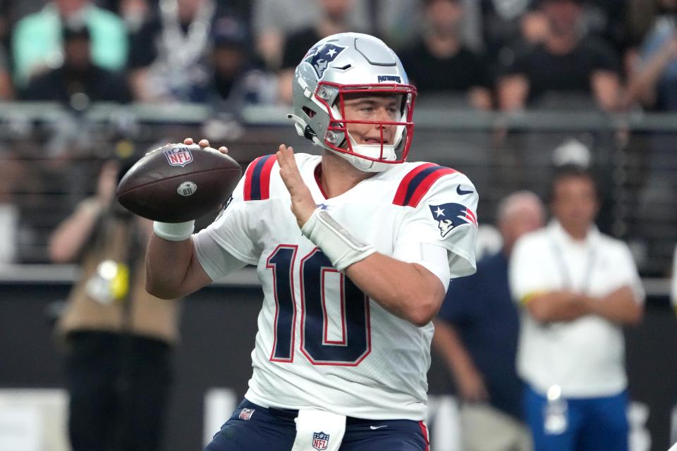 August 26, 2022;  Paradise, Nevada, USA  New England Patriots quarterback Mac Jones (10) throws a pass in the first quarter against the Las Vegas Raiders at Allegiant Stadium.  Mandatory Credit: Kirby Lee-USA TODAY Sports