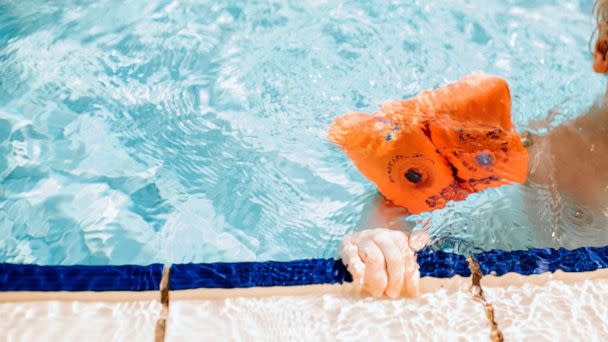 PHOTO: Stock photo of a child learning to swim in a pool. (STOCK PHOTO/Getty Images)