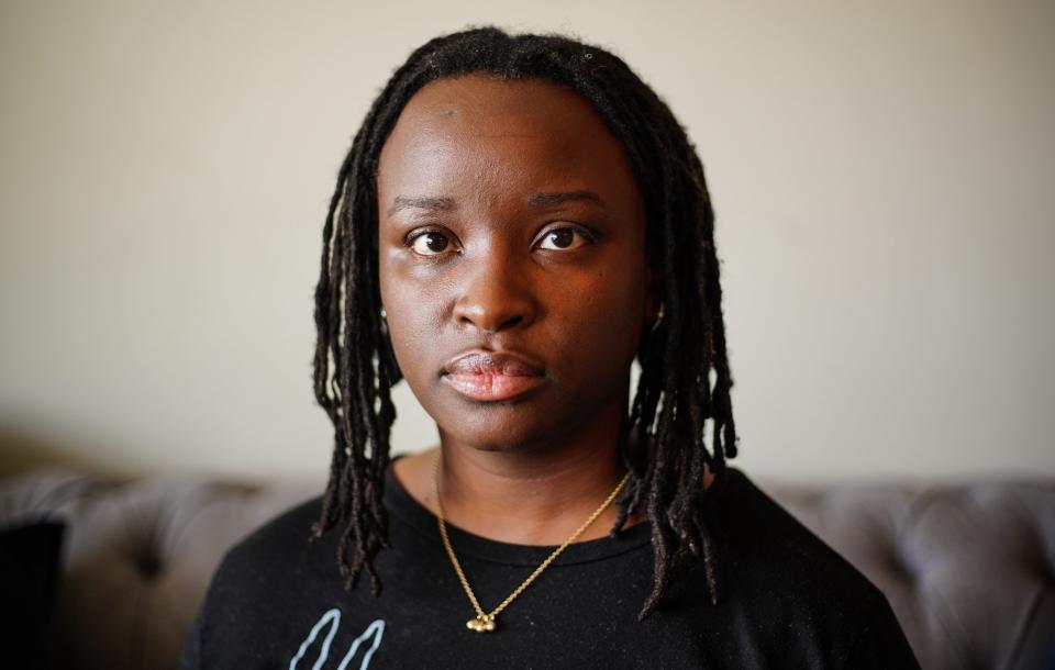 Eboni Taylor of Detroit, Mich. poses for a photo at her apartment in Detroit on Sunday, August 15, 2021.