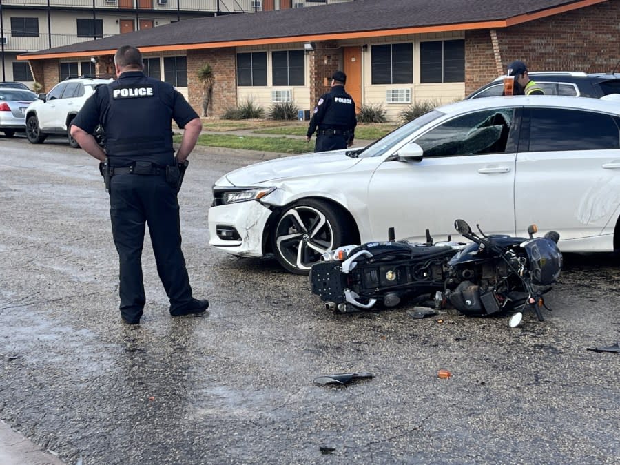 Wreck between a white Honda Accord and a motorcycle on Vanderventer and S. Pierce Street near Angelo State University