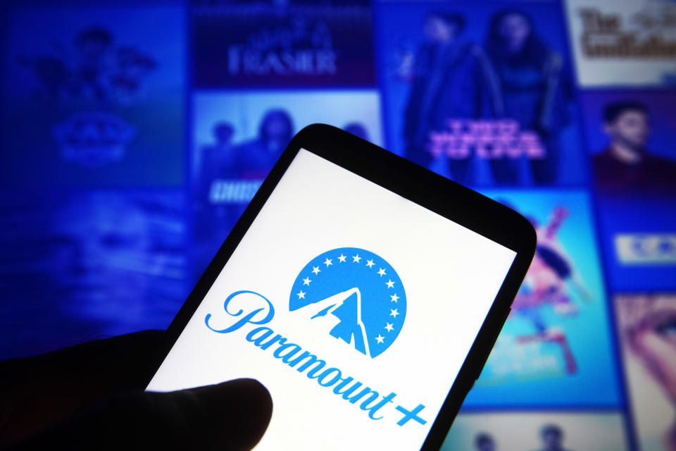 In this photo illustration, Paramount+ (Paramount Plus) logo is seen on a smartphone against its website in the background. (Photo Illustration by Pavlo Gonchar/SOPA Images/LightRocket via Getty Images)