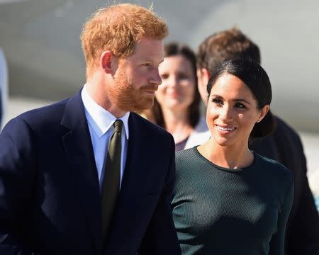 Britain's Prince Harry and his wife Meghan, the Duke and Duchess of Sussex, arrive at the airport for a two-day visit to Dublin, Ireland July 10, 2018. REUTERS/Cathal McNaughton