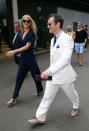 <p>Rocking up for his first Wimbledon 2016 match, the actor rocked a white suit, with a pale blue shirt and navy tie. <i>[Photo: Rex]</i></p>