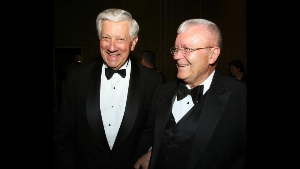 Gulfport Mayor George Schloegel and Fred Haise, Apollo 13 astronaut and Biloxi native, talk before the start of the Salute to the Military Tuesday night.