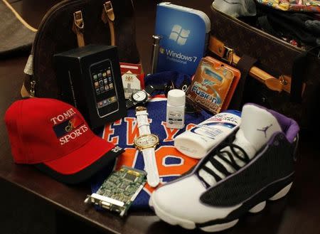 Counterfeit goods seized by the U.S. government are shown on display at the National Intellectual Property Rights Coordination Center in northern Virginia, in this file photo taken on October 7, 2010. REUTERS/Jason Reed