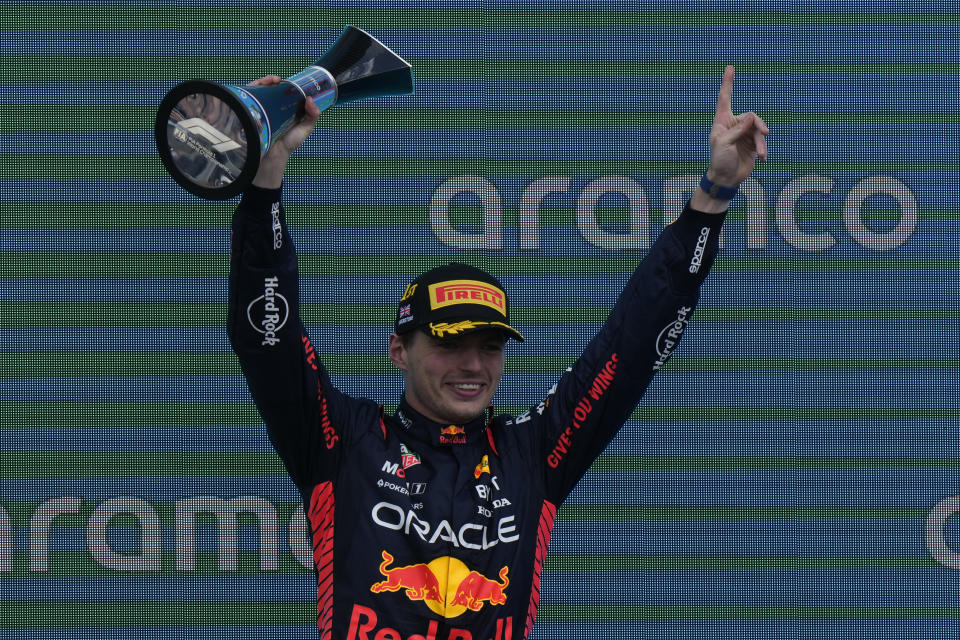 Red Bull driver Max Verstappen of the Netherlands celebrates on the podium after winning the British Formula One Grand Prix race at the Silverstone racetrack, Silverstone, England, Sunday, July 9, 2023. (AP Photo/Luca Bruno)