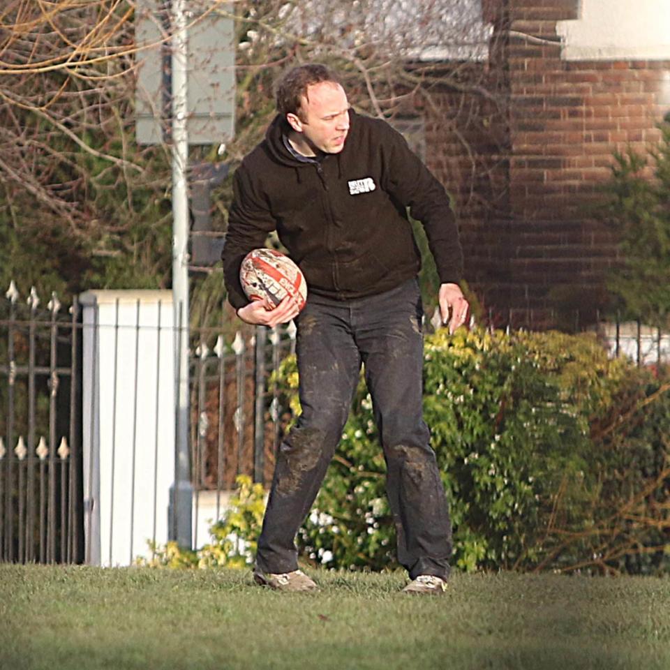 Matt Hancock and his two sons went to a park across the street from his London home to play rugby - Greg Brennan