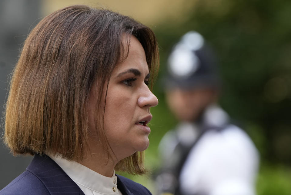 Belarus opposition leader Sviatlana Tsikhanouskaya speaks to the media outside 10 Downing Street after a meeting with the British Prime Minister Boris Johnson in London, Tuesday, Aug. 3, 2021. (AP Photo/Alastair Grant)