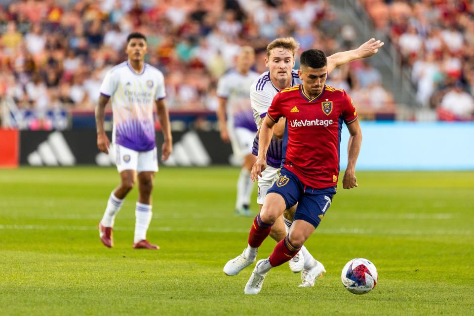 Orlando City’s Duncan McGuire and Real Salt Lake’s Pablo Ruiz fight for possession of the ball at the America First Field in Sandy on Saturday, July 8, 2023. | Megan Nielsen, Deseret News