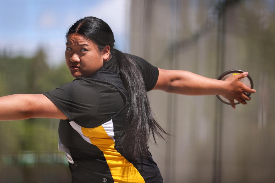Cascade’s Kalina Saechao prepares to throw in the 4A girls discus during the OSAA State Track and Field Championships on Saturday, May 18, 2024 at Hayward Field in Eugene, Ore.