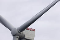 The first operating South Fork Wind farm turbine, Thursday, Dec. 7, 2023, 35 miles east of Montauk Point, N.Y. The turbine at the commercial-scale offshore wind farm is producing power for the U.S. electric grid for the first time. (AP Photo/Julia Nikhinson)