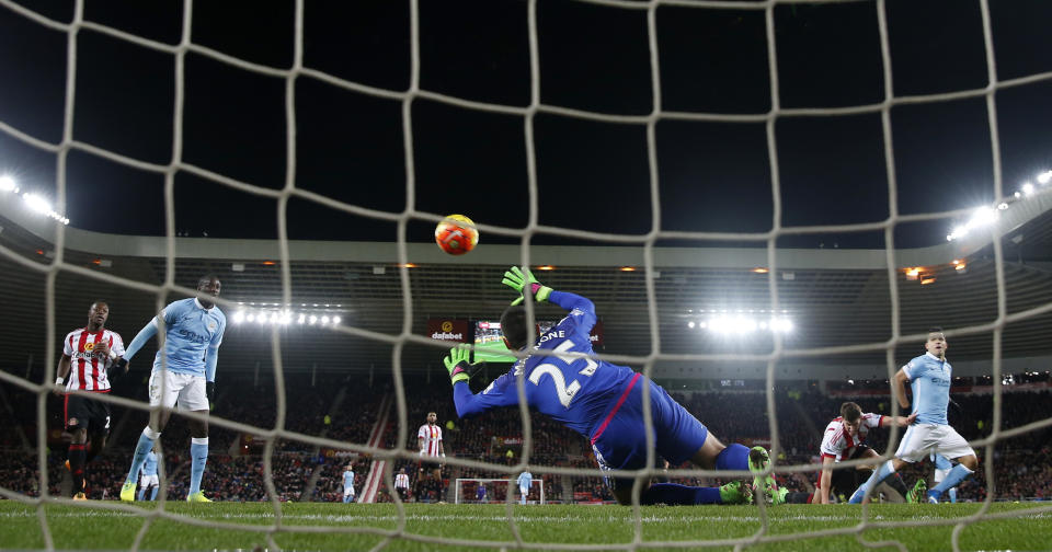 Football Soccer - Sunderland v Manchester City - Barclays Premier League - Stadium of Light - 2/2/16 Manchester City's Sergio Aguero scores their first goal Action Images via Reuters / Lee Smith Livepic EDITORIAL USE ONLY. No use with unauthorized audio, video, data, fixture lists, club/league logos or "live" services. Online in-match use limited to 45 images, no video emulation. No use in betting, games or single club/league/player publications. Please contact your account representative for further details.