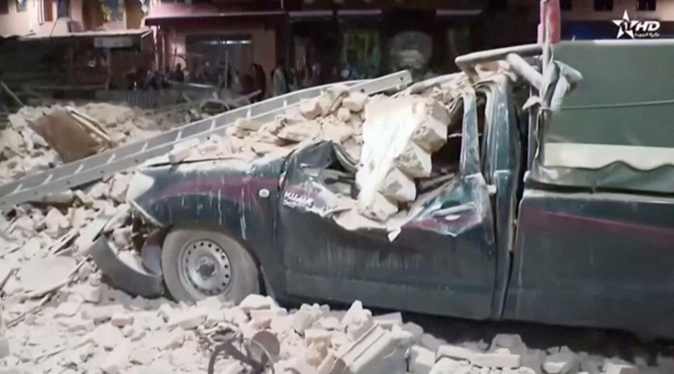 View of a damaged car and debris from the earthquake in Marrakech (via REUTERS)