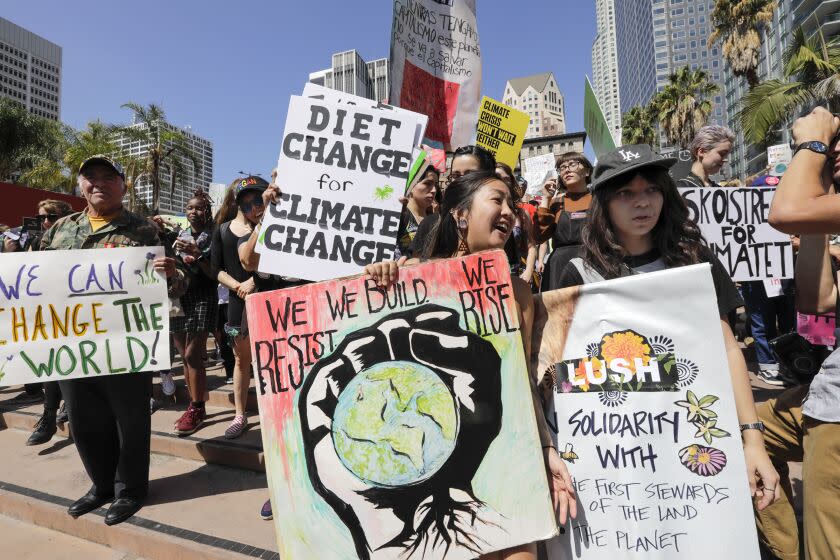 LOS ANGELES, CA - SEPTEMBER 20, 2019 — Student activists rally in a climate change protest in Pershing Square, Los Angeles on Friday afternoon September 20, 2019 as part of the global climate walkout movement. The global climate strike protests have been inspired by Greta Thunberg, a 16-year-old Swedish activist who sailed across the Atlantic Ocean in a zero-emission yacht rather than fly and on Wednesday met with members of Congress, urging them to heed scientists' warnings on climate change. (Irfan Khan/Los Angeles Times)