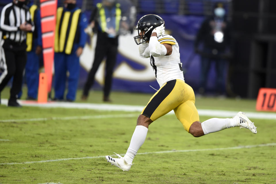 Pittsburgh Steelers free safety Minkah Fitzpatrick celebrates after deflecting a pass intended for Baltimore Ravens wide receiver Willie Snead, not visible, with no time left in the second half of an NFL football game, Sunday, Nov. 1, 2020, in Baltimore. The Steelers won 28-24. (AP Photo/Gail Burton)