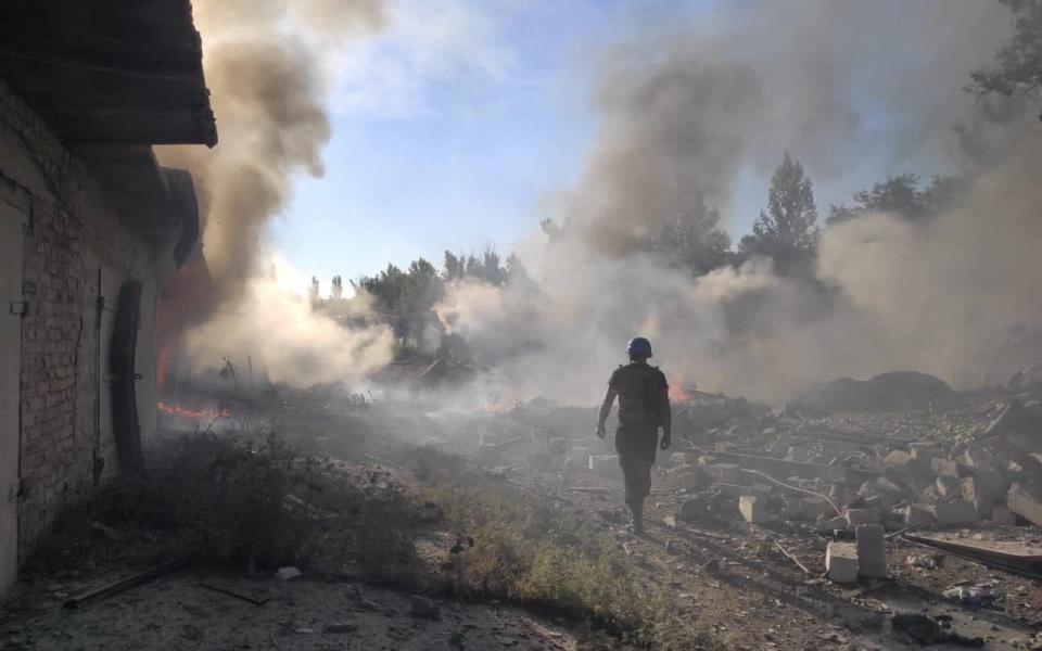 A rescuer walks among debris at a site of a residential area destroyed by a Russian military strike in the town of Toretsk, Donetsk region - STATE EMERGENCY SERVICE OF UKRAINE/REUTERS