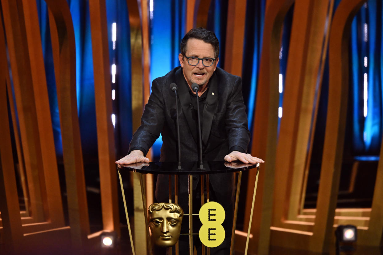 LONDON, ENGLAND - FEBRUARY 18: Michael J Fox presents the Best Film Award on stage during the EE BAFTA Film Awards 2024 at The Royal Festival Hall on February 18, 2024 in London, England. (Photo by Kate Green/BAFTA/Getty Images for BAFTA)