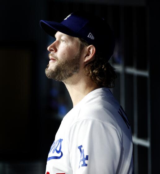 Clayton Kershaw of the Los Angeles Dodgers and his family poses