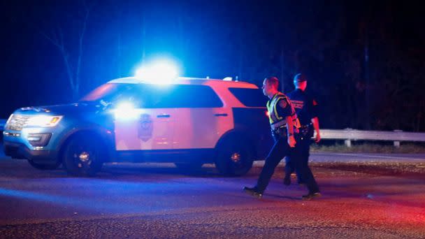 PHOTO: Police block the entrance to I-540 east at Buffaloe Road in Raleigh, N.C., Oct. 13, 2022.  (Ethan Hyman/The News & Observer via AP)