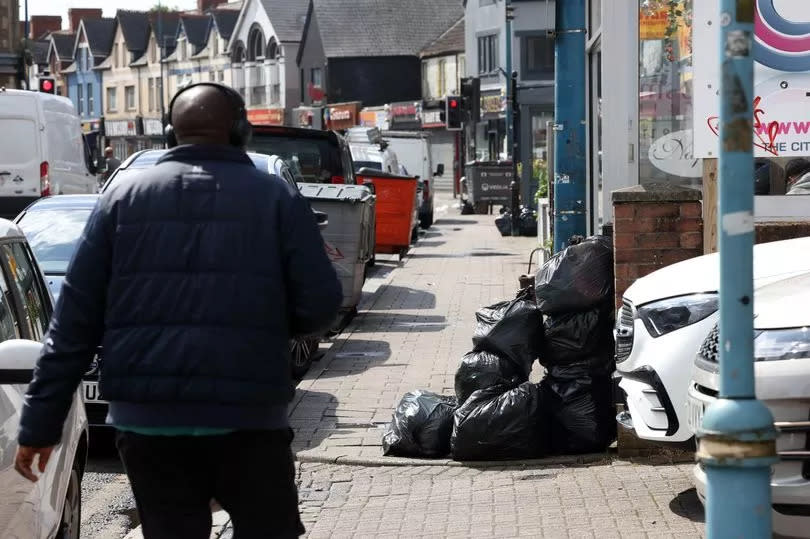 Bins piled up on City Road