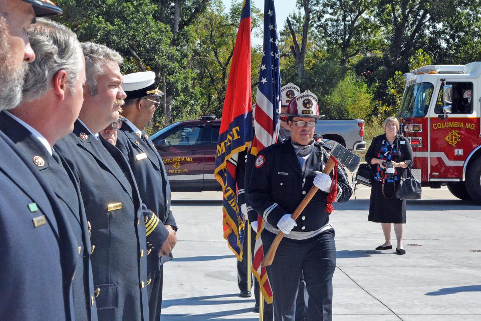 The Columbia Fire Department honor guard prepares Tuesday to present the colors during the station 11 grand opening.