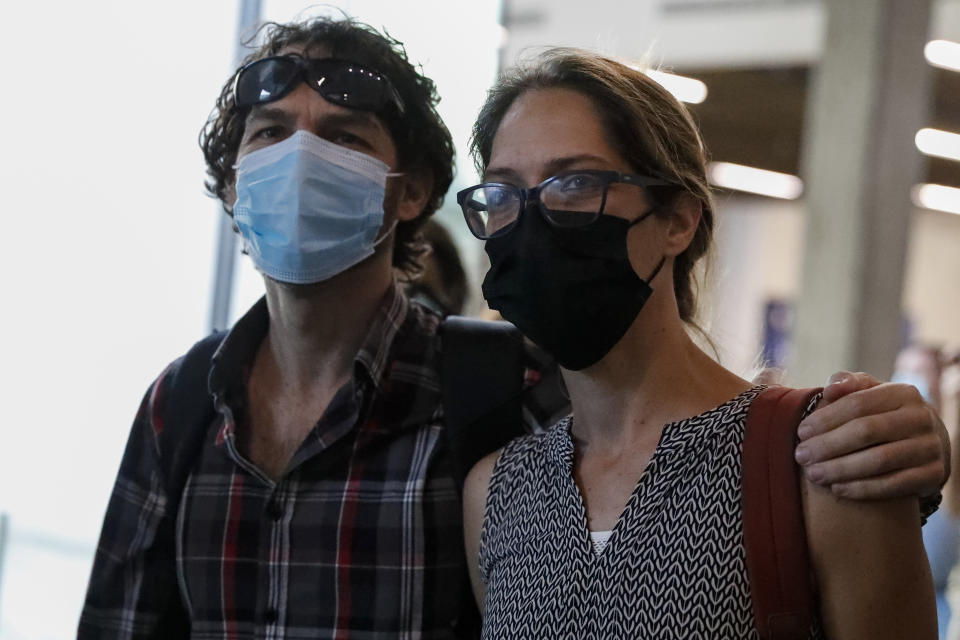 Aya Biran, a paternal aunt of Eitan Biran, who survived a cable car crash in Italy that killed his immediate family, arrives at court in Tel Aviv, Thursday, Nov. 11, 2021. (AP Photo/Ariel Schalit)