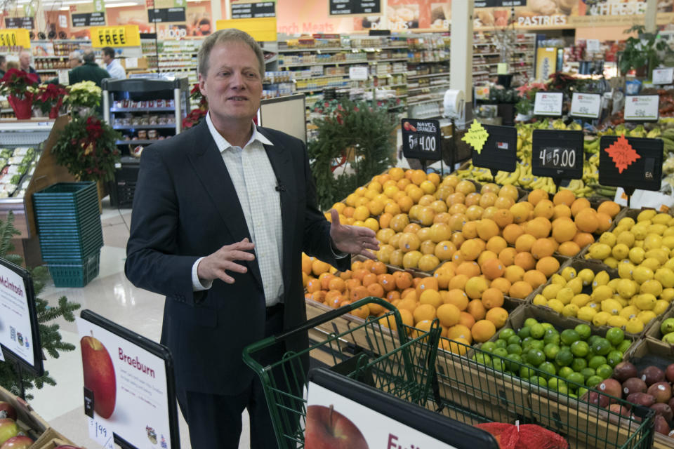 FILE - In this Dec. 6, 2016 file photo, Brian Wansink speaks during an interview in the produce section of a supermarket in Ithaca, N.Y. On Friday, Sept. 21, 2018, the prominent food researcher is defending his work a day after Cornell University said he engaged in academic misconduct and was removed from all teaching and research positions. (AP Photo/Mike Groll)